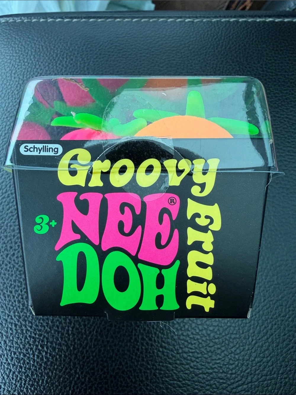 NeeDoh Groovy Fruit Squish Toys - Yellow Banana, Pink Strawberry, Orange Orange
